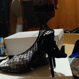 "Not My Problem" fishnet pumps